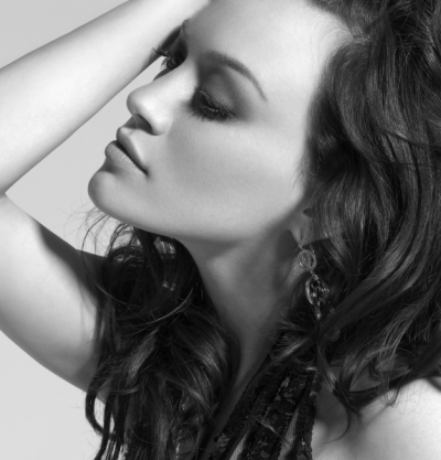 Wavy in some places. Eyes: Piercing green. Height: 5"10. BACKGROUND