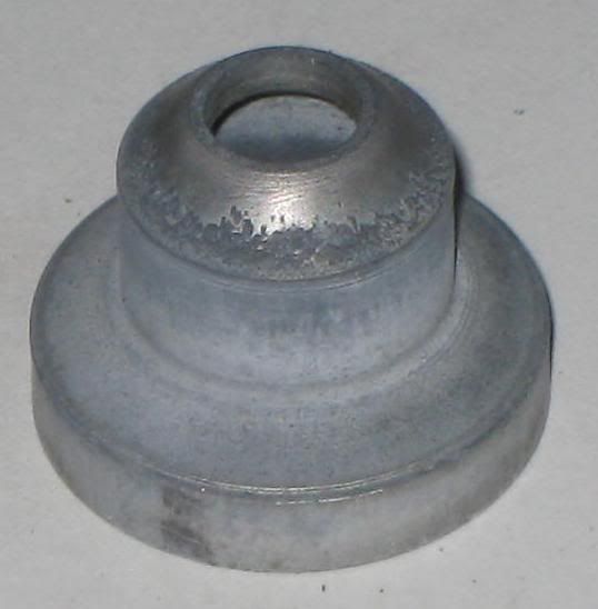 The front of the barrel sits inside of a ported adapter. The front of the barrel sits inside of a ported adapter.